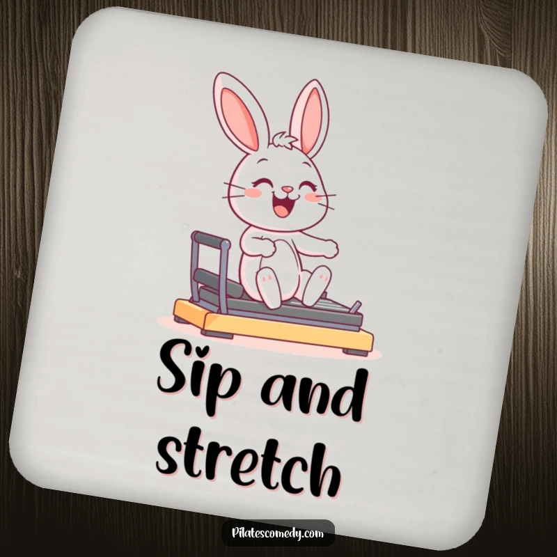 Funny joyful bunny character smiling, in a graceful pose on a Pilates reformer machine, on a protective drink coaster.