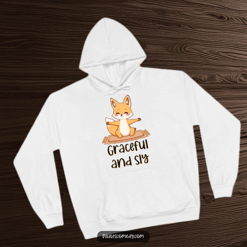 Funny fox design on a cozy hoodie, fox is gracefully stretching on a yoga mat, perfect for yoga lovers.