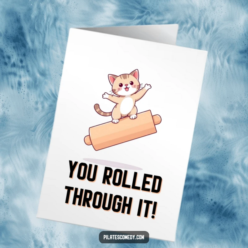 Funny free printable congratulations card showing a cat wobbling on a roller, celebrating a tricky accomplishment.